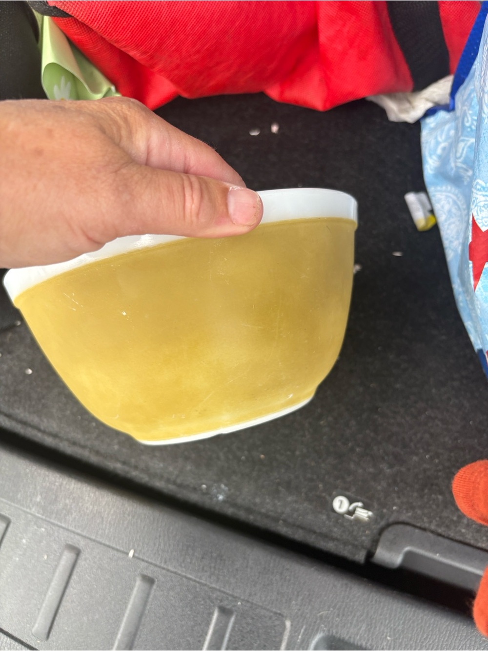 Pyrex Americana mixing bowl in a gold color.